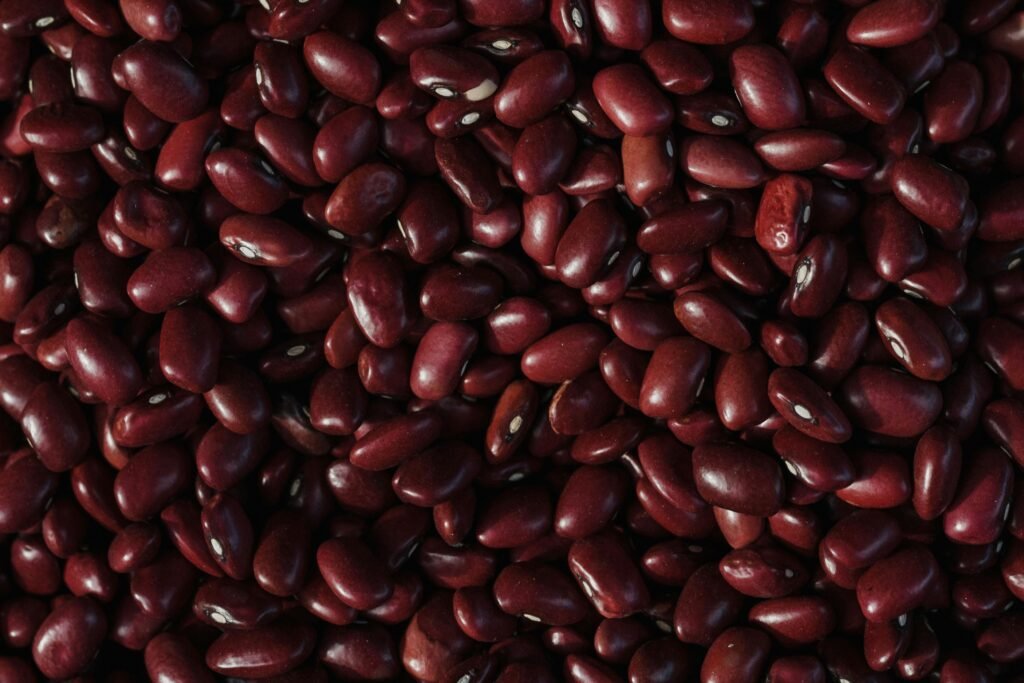 Overhead shot of organic red kidney beans showcasing texture and color.